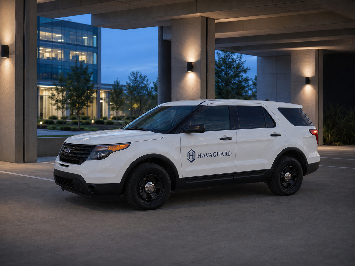 White HAVAGUARD mobile patrol vehicle at a commercial parking facility